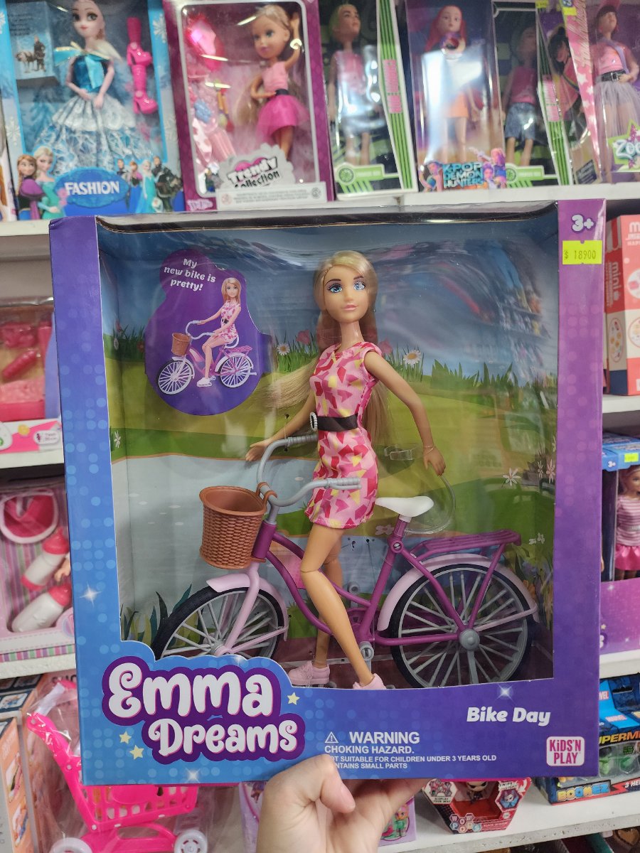 Muñeca con bici