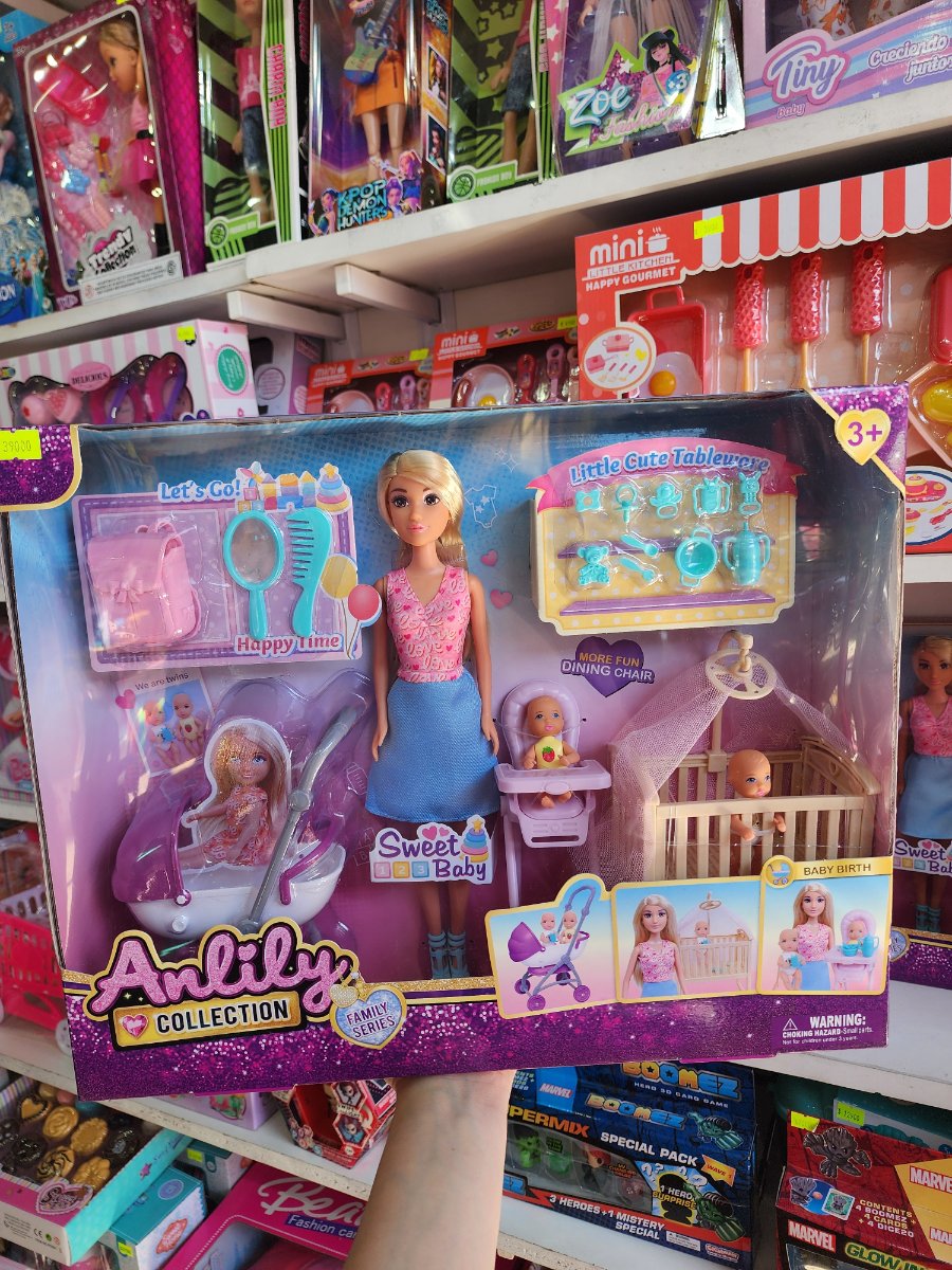 Muñeca con hijos